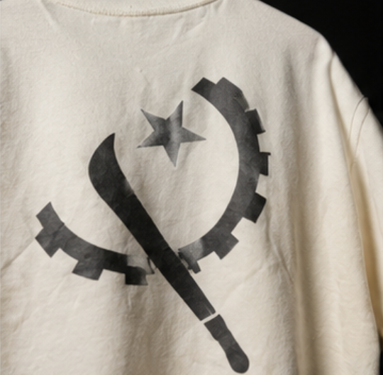 Close-up of the Angola-inspired back graphic on the T da Banda T-shirt